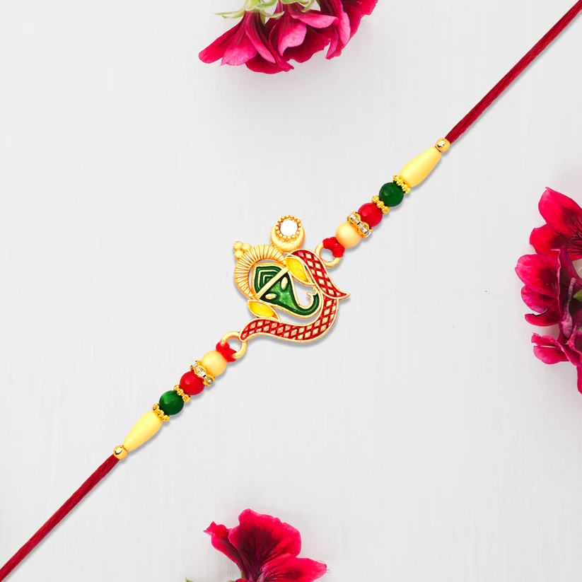 [KBS-1063] Green Enamel Lord Ganesha Rakhi with Decorative Red Thread and Golden Accents